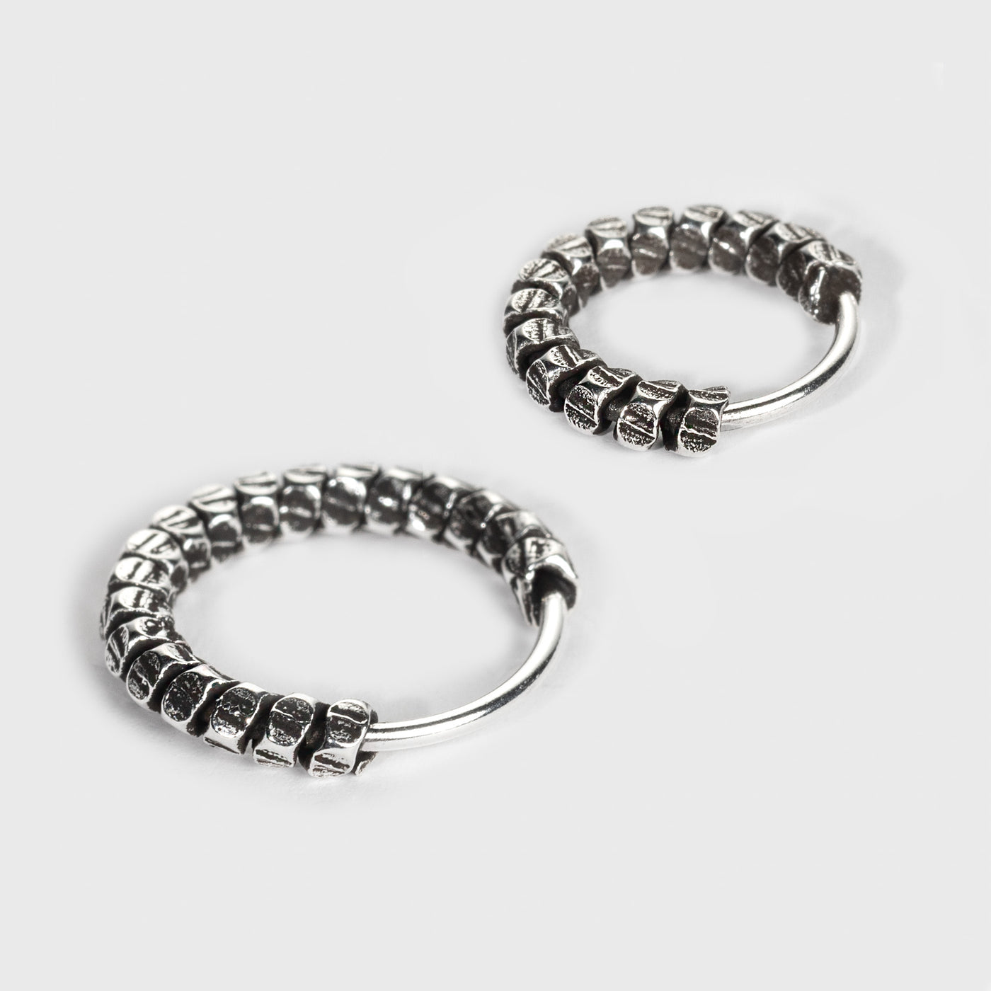 Silver Nose Ring, Segmented Design with an oxidized finish