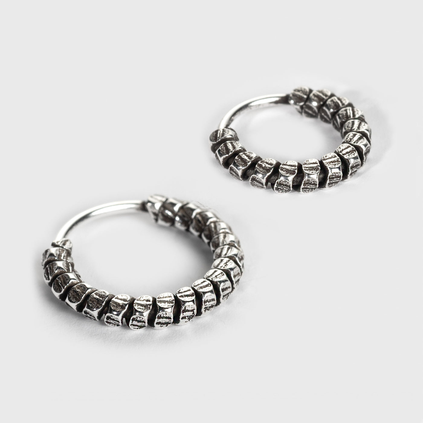 Silver Nose Ring, Segmented Design with an oxidized finish